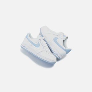 white and light blue nikes