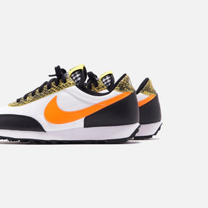 orange and black nikes