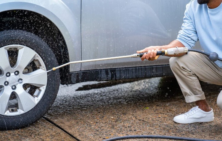 super jet washer being used to clean car