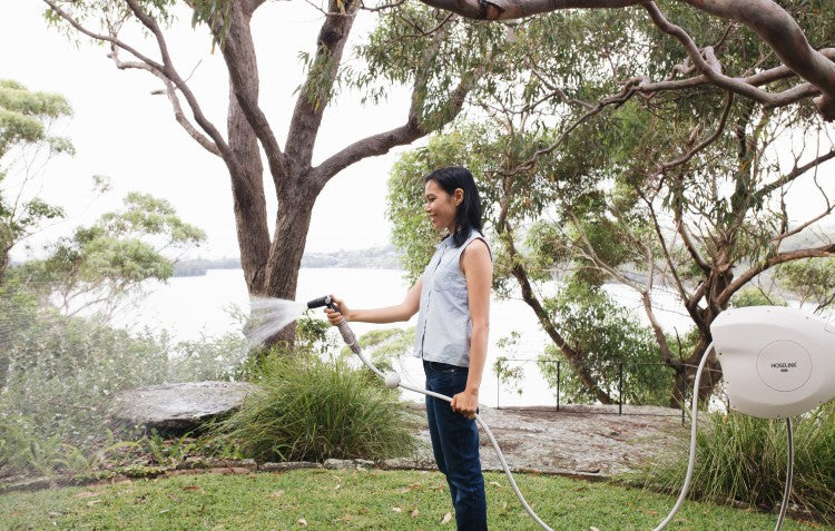 woman-watering-garden