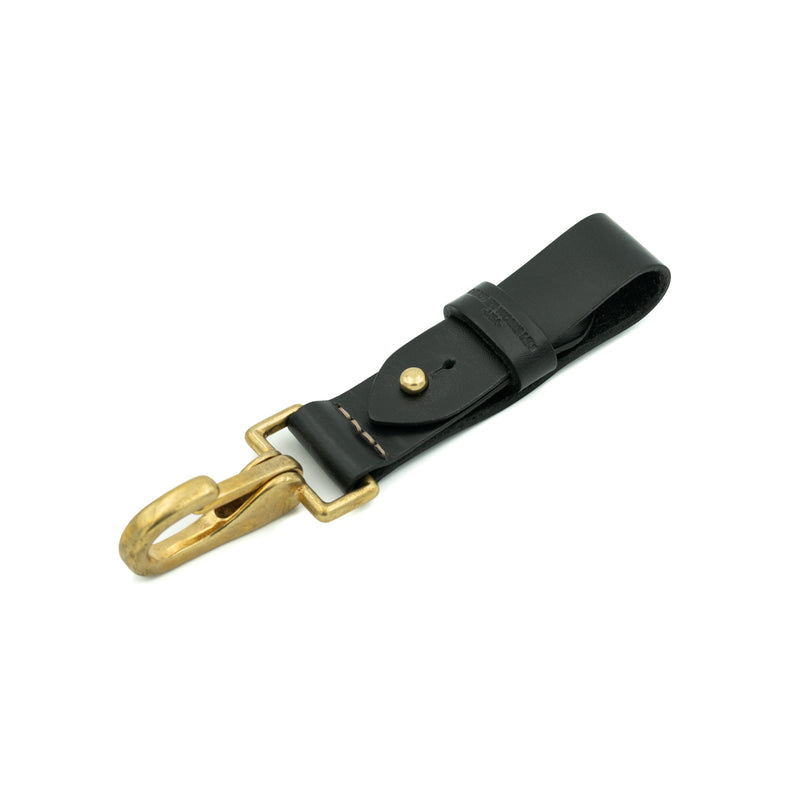 Black leather key fob with brass hardware