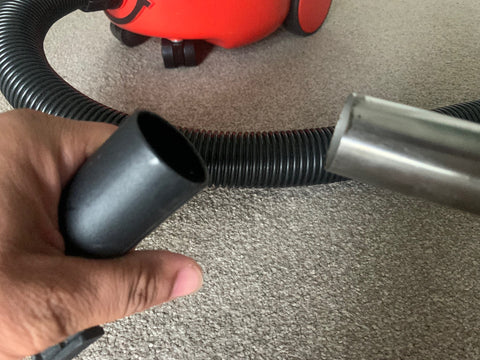 how to remove henry hoover floor head from metal pipes that are stuck 