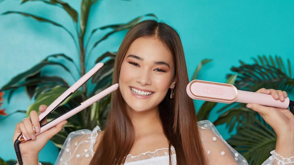A smiling girl holding TYMO hairstyling tools