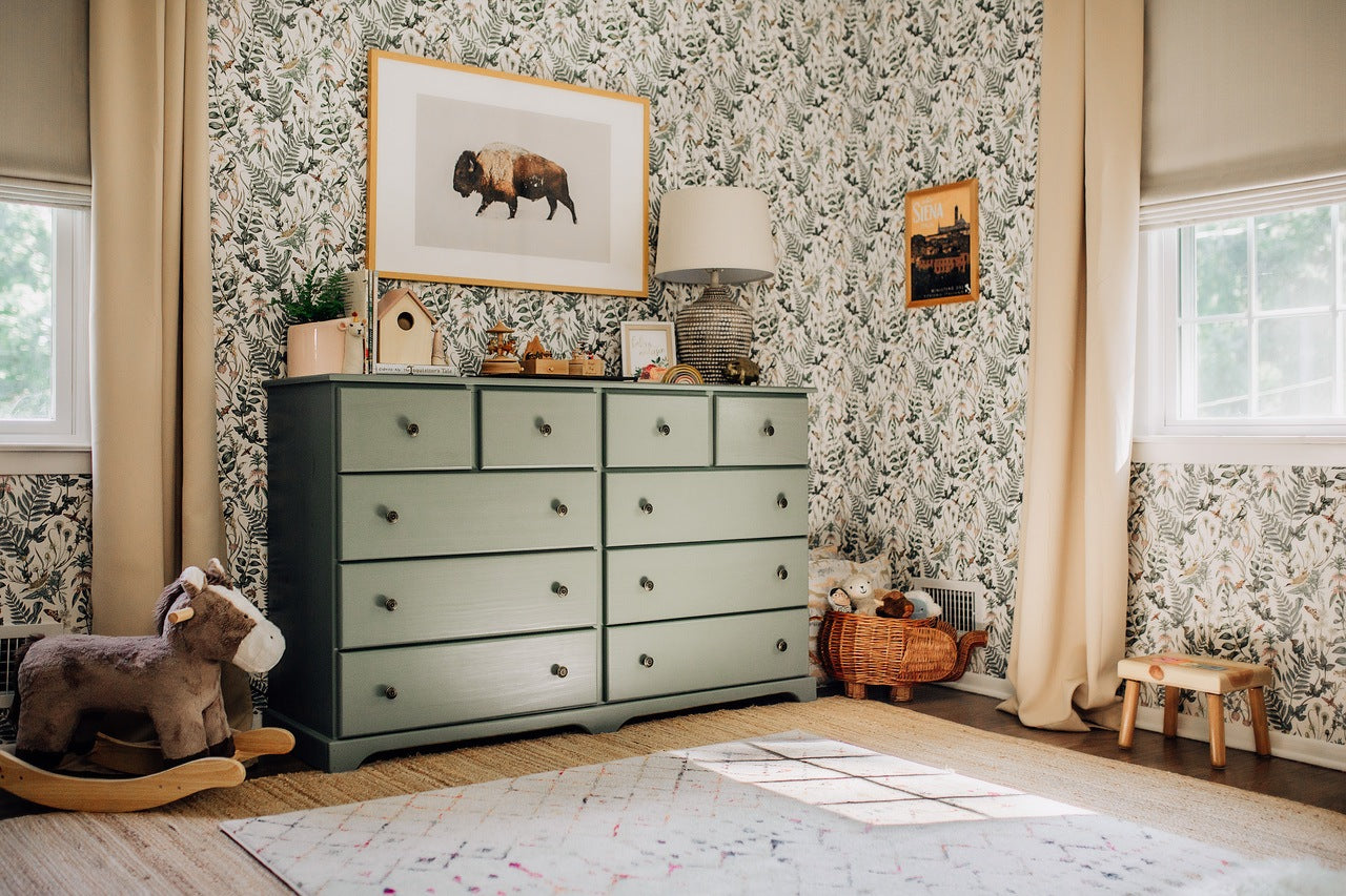 Toddler girl's nursery featuring Secret Garden wallpaper in White by Lisel Jane Ashlock for Hygge & West