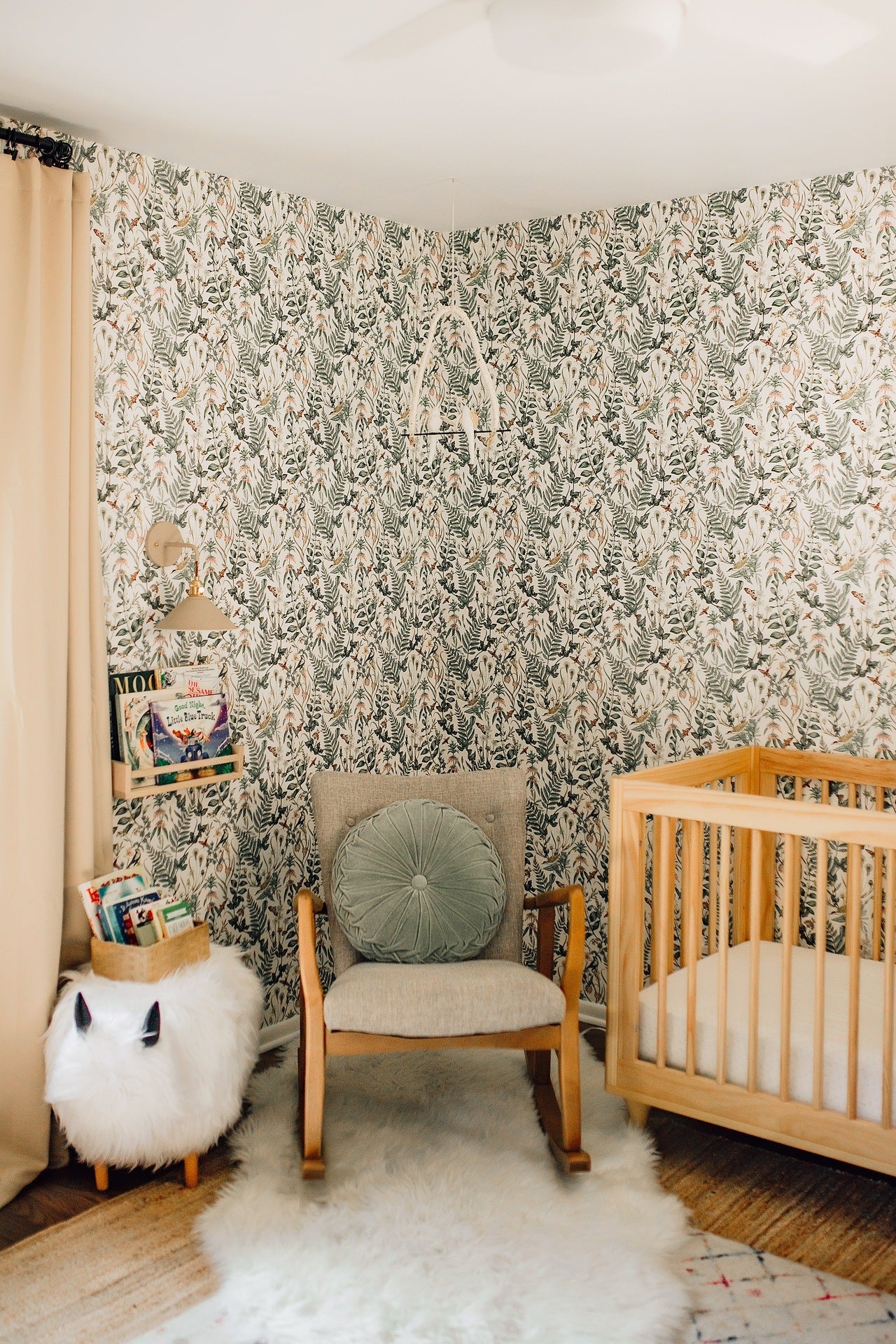 Toddler girl's nursery featuring Secret Garden wallpaper in White by Lisel Jane Ashlock for Hygge & West