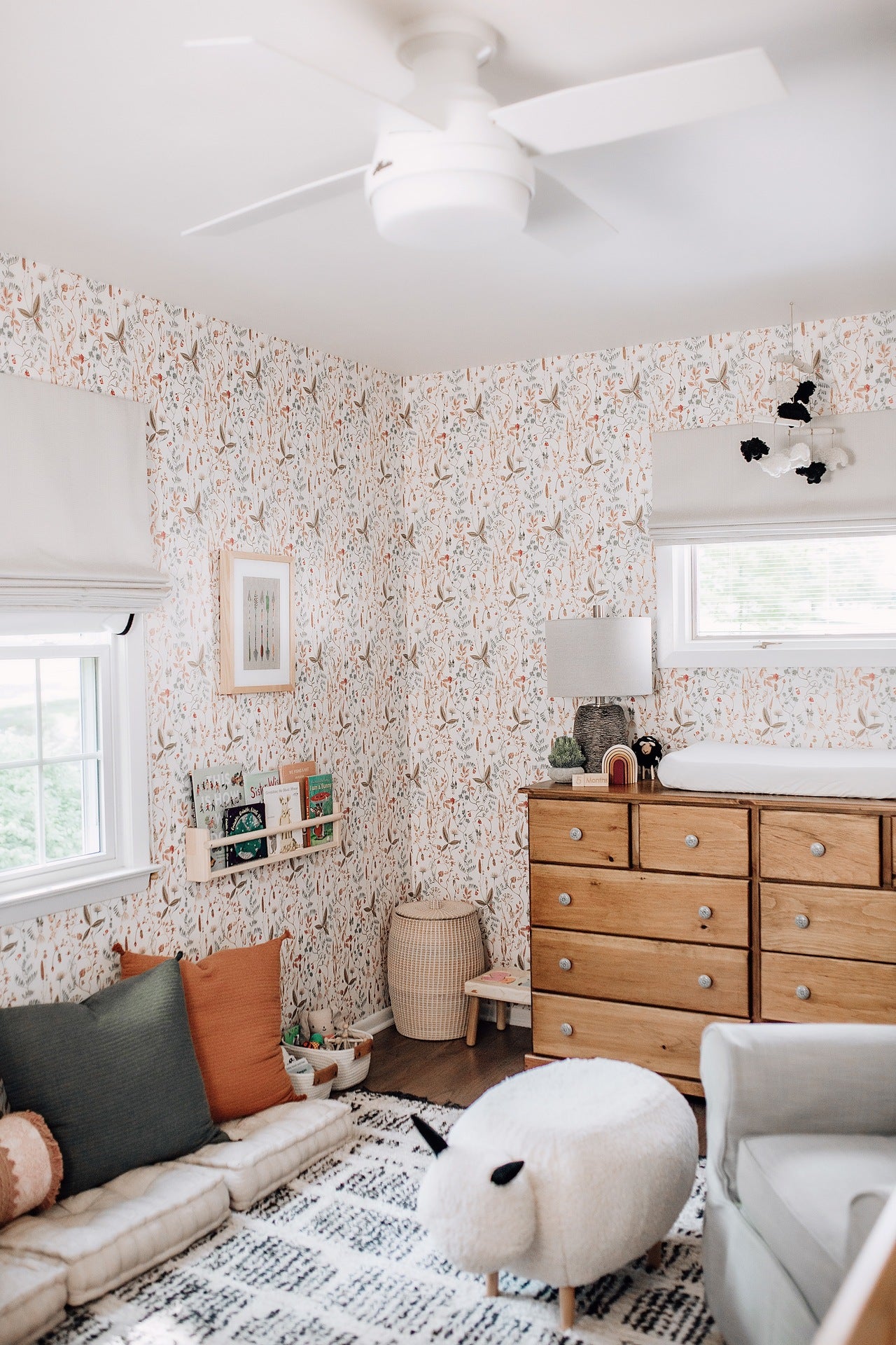 Infant girl's nursery featuring Sonoma wallpaper in White by Lisel Jane Ashlock