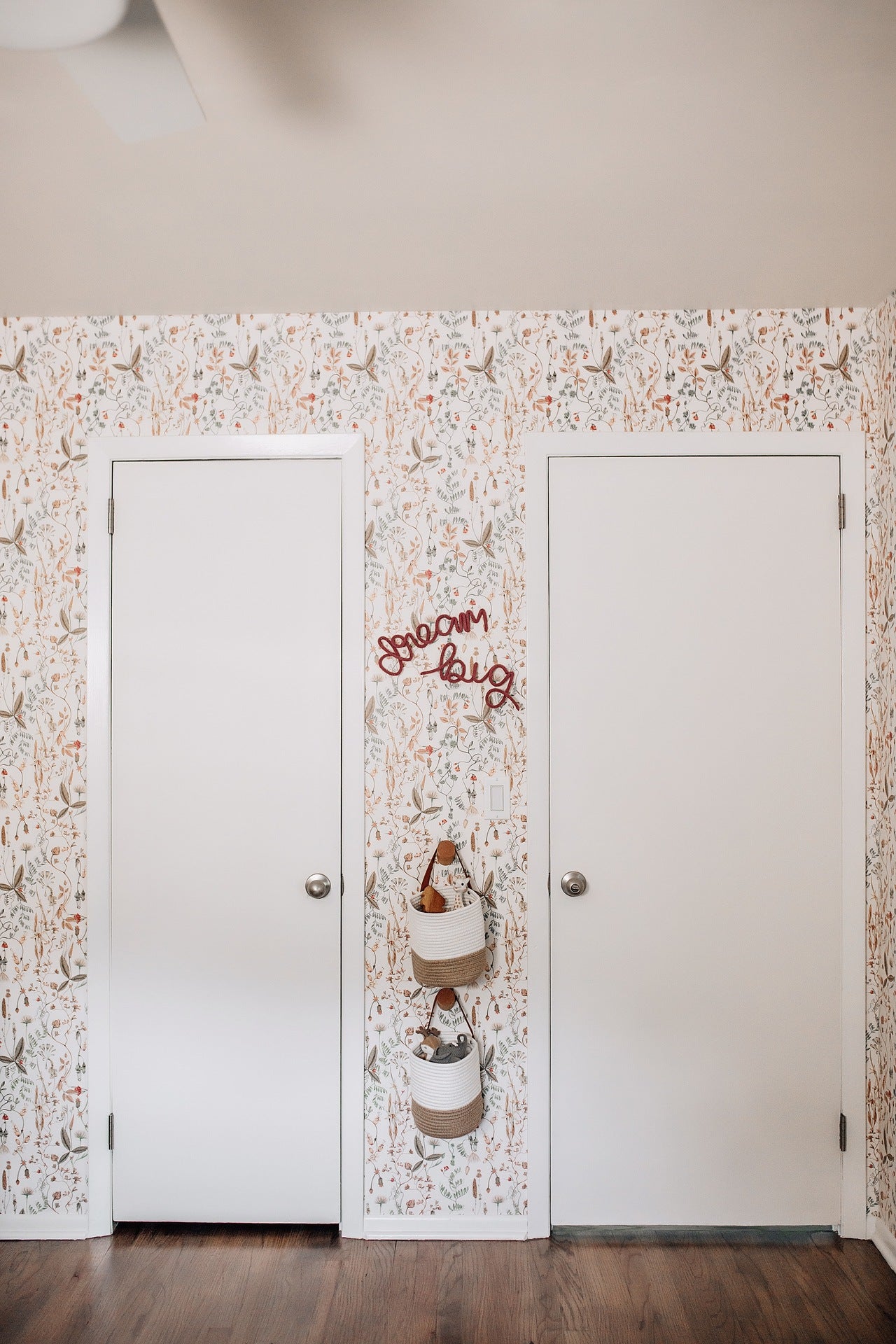 Infant girl's nursery featuring Sonoma wallpaper in White by Lisel Jane Ashlock