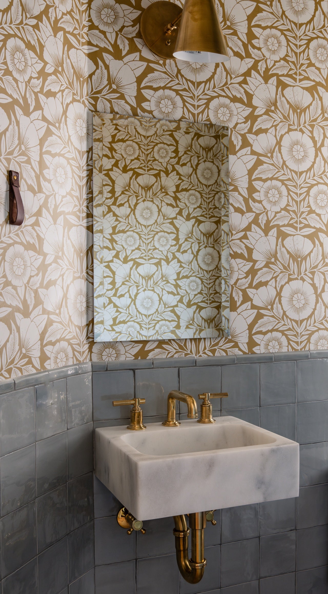 Conservatory (Ochre) Wallpaper in a bathroom designed by Sarah Malek Barney