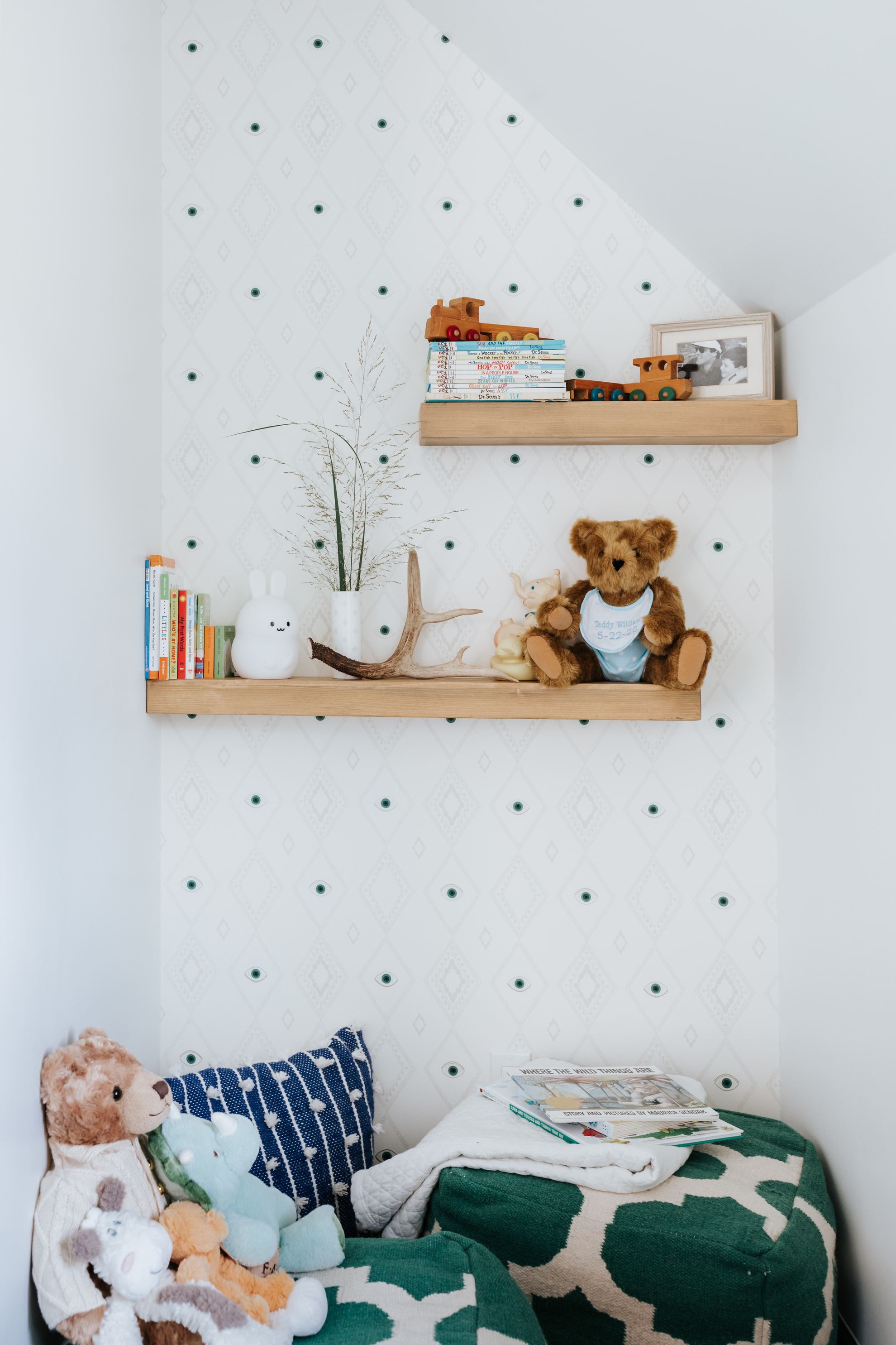 Little boy's nursery reading nook by Samantha Pappas featuring Evil Eye wallpaper in Green by Coral & Tusk for Hygge & West