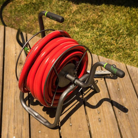 How does a retractable hose reel work?