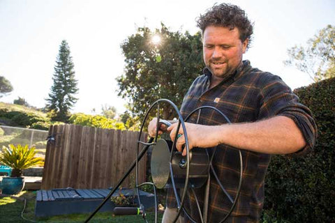Attach garden hose to hose reel