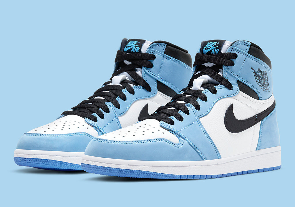 How To Spot Real Vs Fake Jordan 1 Retro High University Blue Black ...