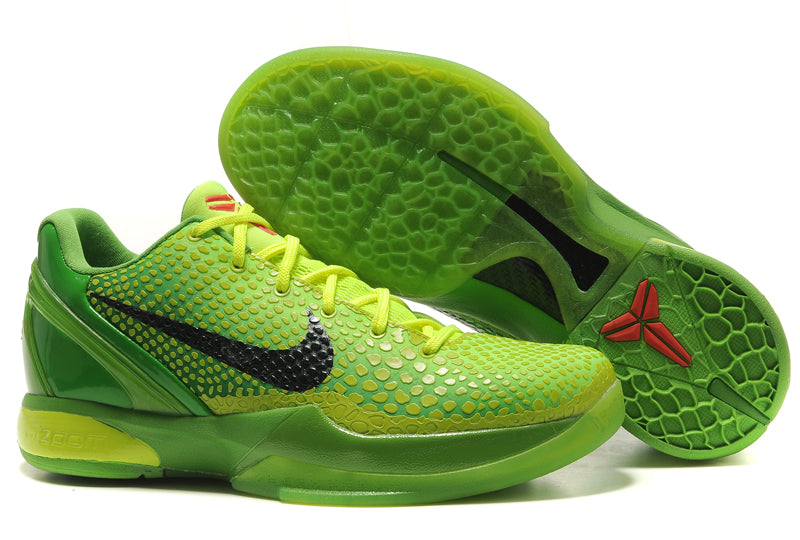 a pair of kobe green sneakers