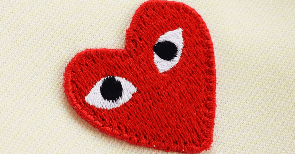 Comme des Garcons logo patch close-up shot