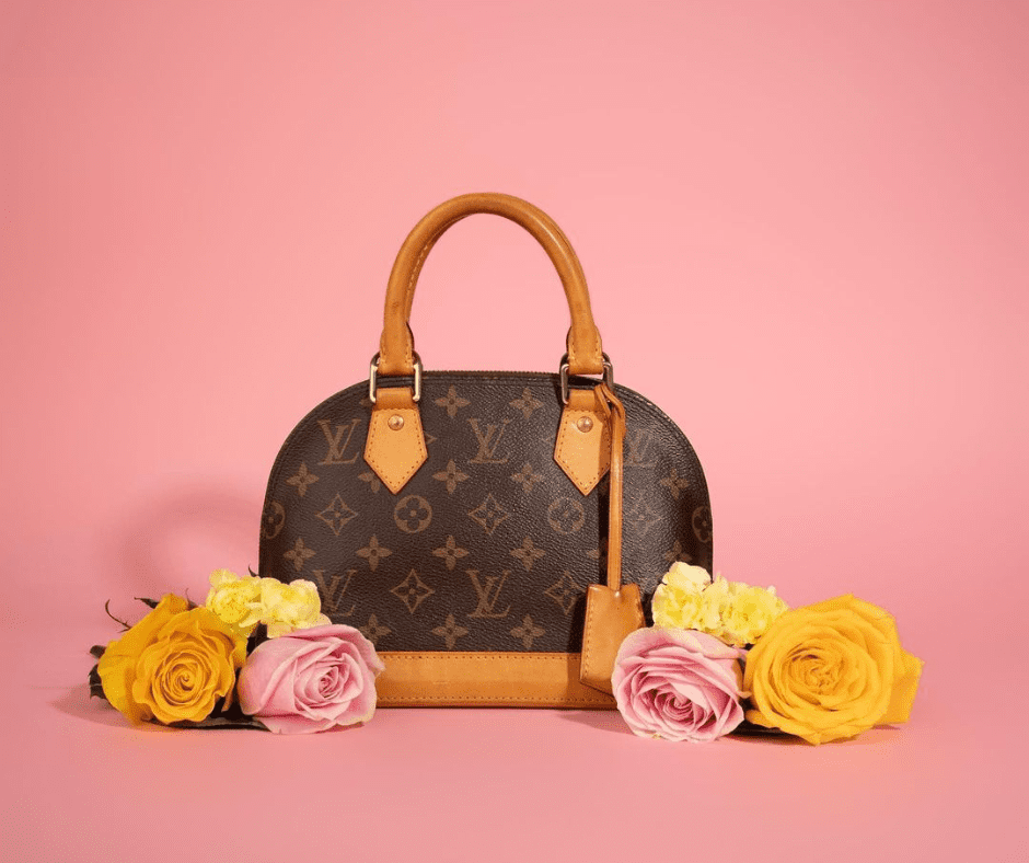LV bag on a pink background