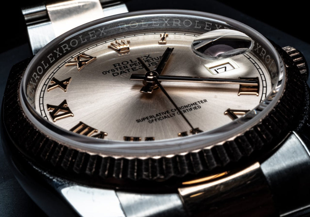 a golden bezel of a watch