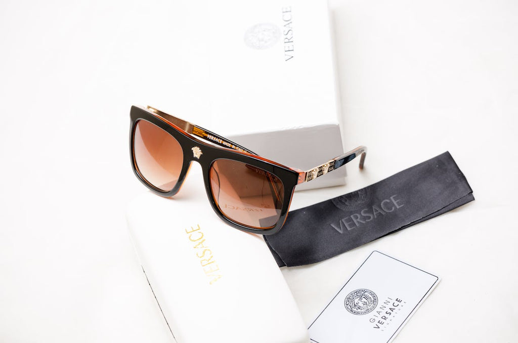 a pair of authentic versace sunglasses