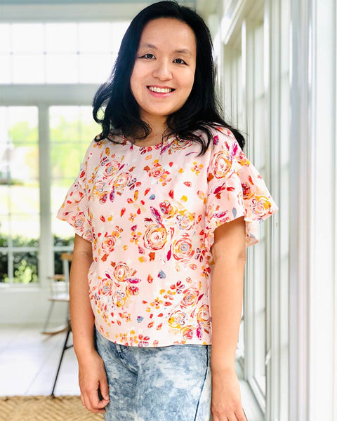 Forget-me-not Lola blouse with ruffle sleeves in floral print, front view