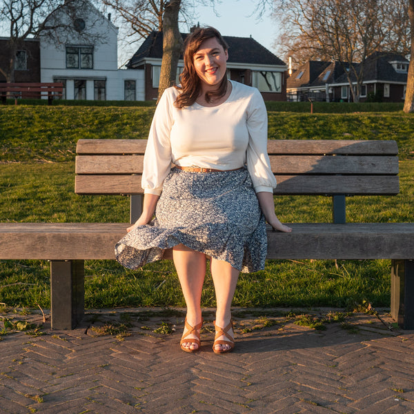 Seated shot of Bri wearing Forget-me-not Patterns Ella Skirt with elastic waist hack