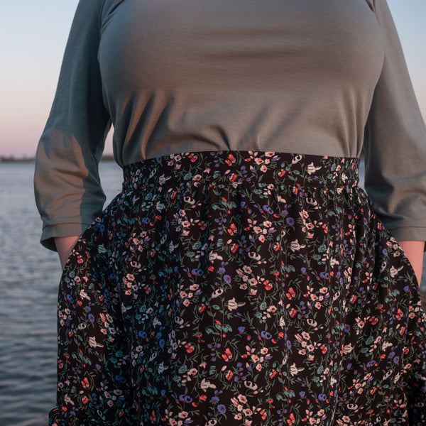 Close up black floral Forget-me-not Patterns Ella Skirt with elastic waist hack