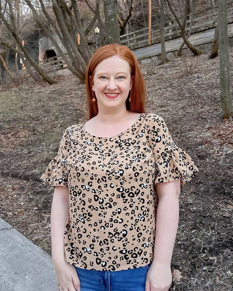 Forget-me-not Lola blouse with ruffle sleeves in leopard print, front view