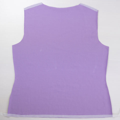 Back bodice piece of a tee shirt cut from lilac jersey.