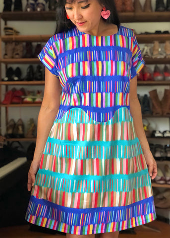 April A-Line dress make in blue and red and aqua pattern by Nadia