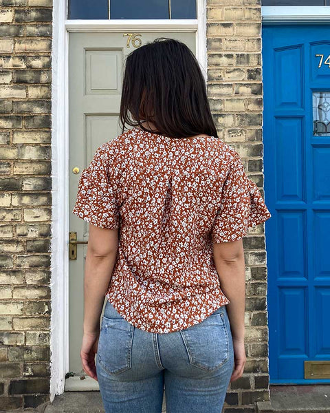 Forget-me-not Lola blouse in red ditsy print, back view