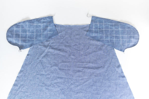 Skirt slash pocket being sewn with both pocket bags in progress