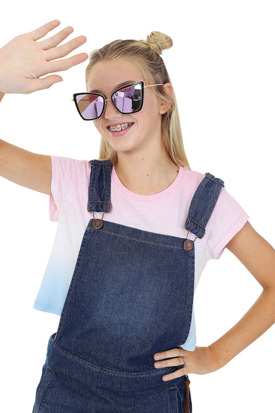 Wearing denim bib overall dress and 2-tone t-shirt with pink mirror shades.