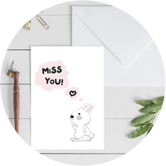 White bunny thinking 'Miss You' illustration on white A6 Poppleberry positivity postcard