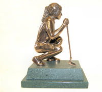 Crouching as the putter must when sizing up the undulations of the green, this small figure encapsulates the hidden tension of the moment. She has clear presence and lasting appeal. This piece has all the attributes of the major figures despite its relatively small size. 