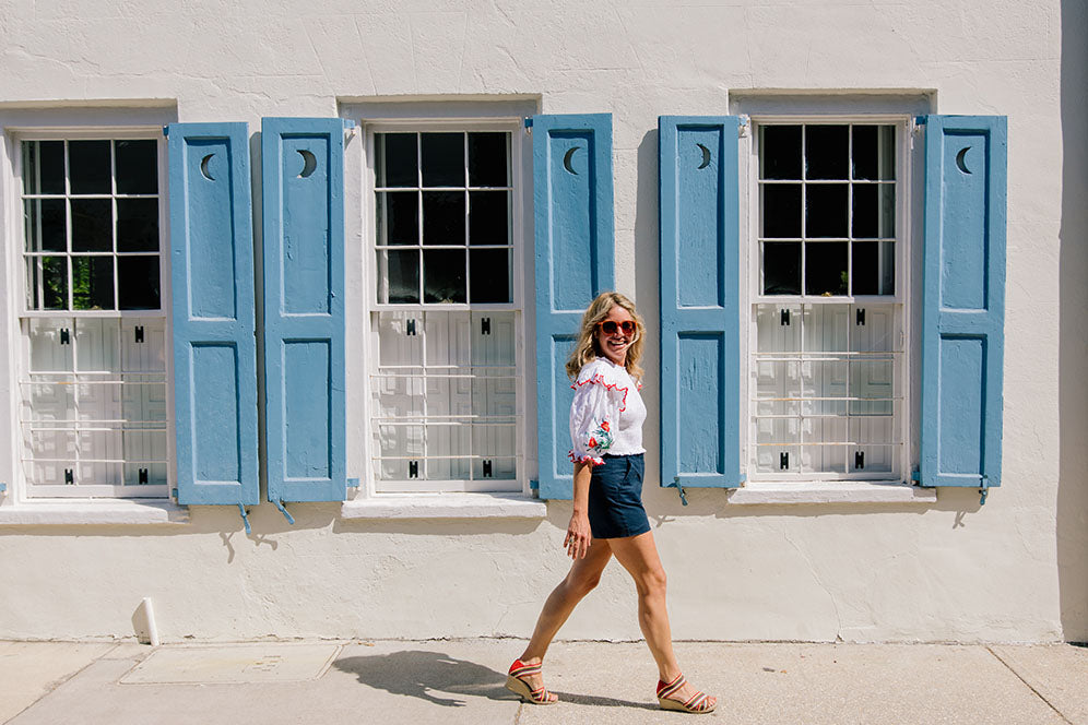 walking down street wearing sandals