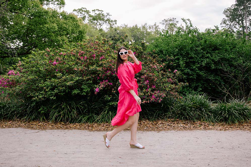 woman in pink dress and heels