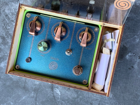 Hand build guitar effects pedals in a beautiful cyan finish
