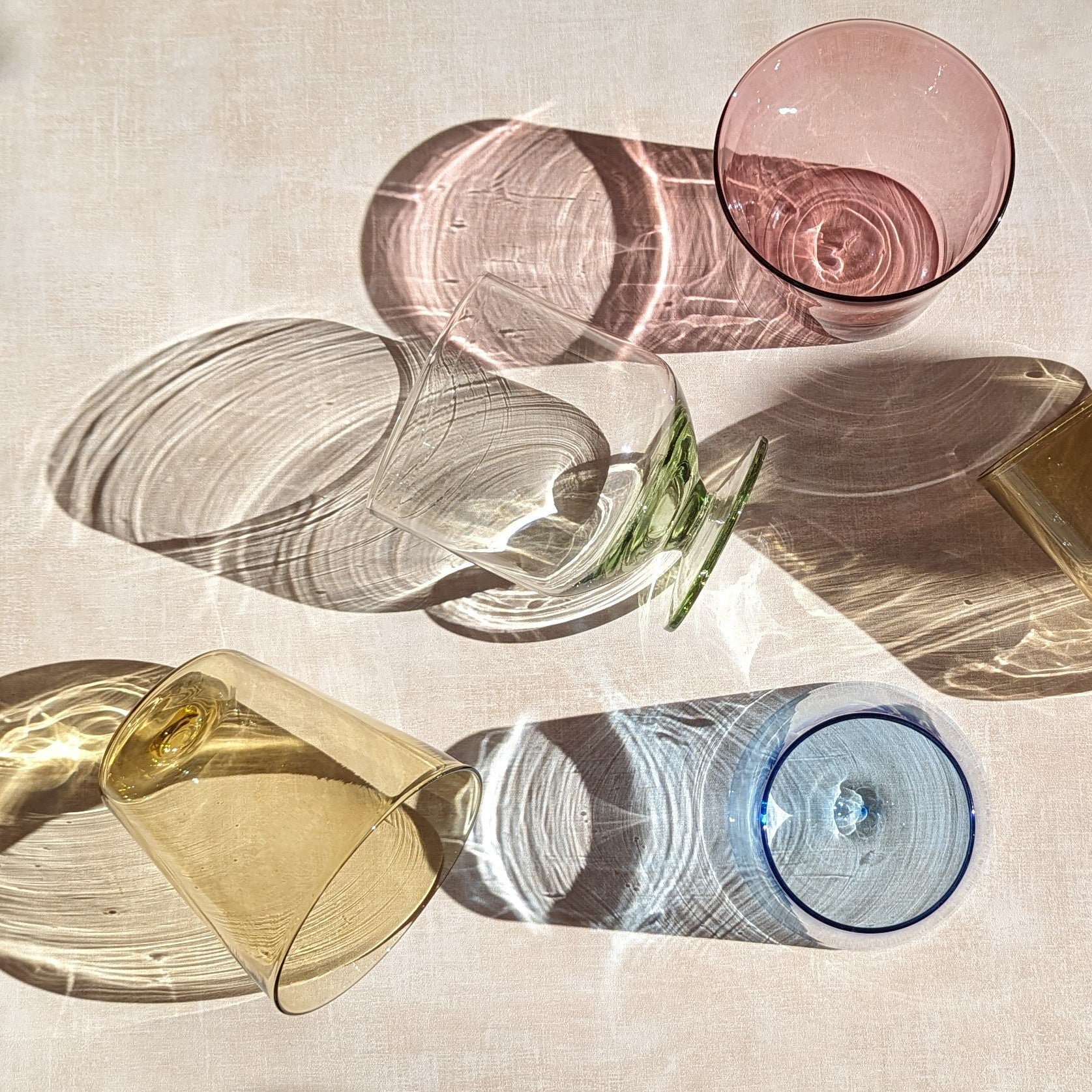 Colored glassware in sunny light