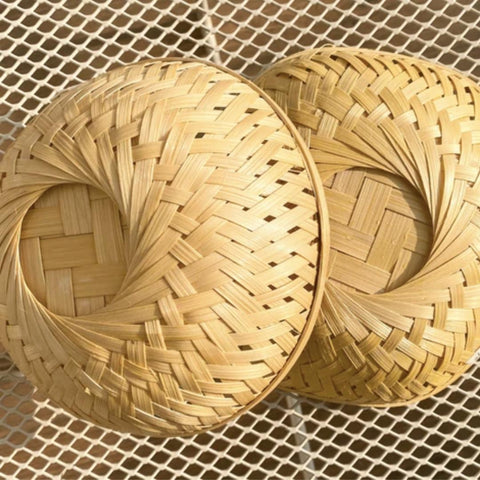 Drying bamboo basket in sun