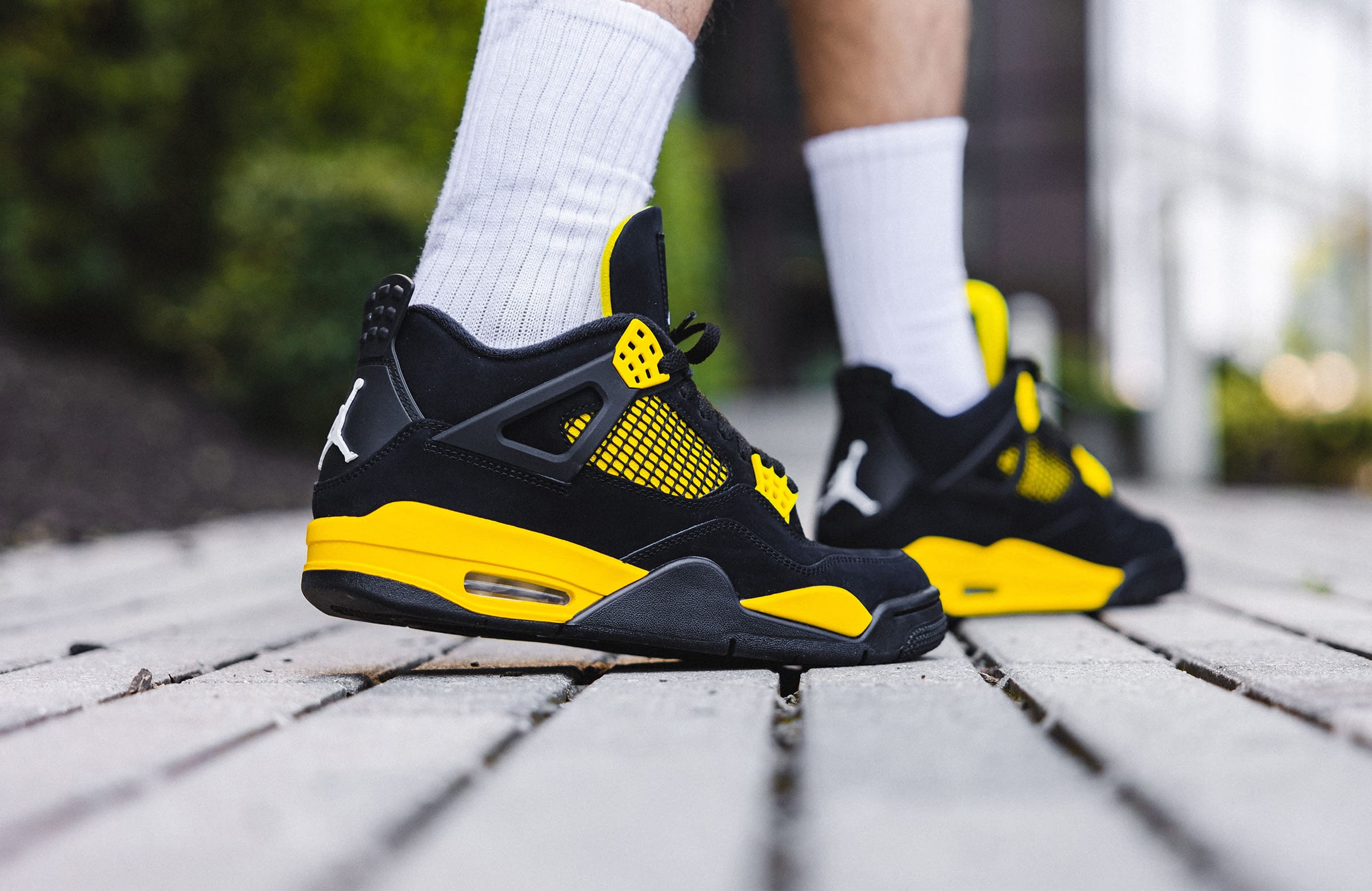 The Air Jordan 4 Retro “Thunder” is Rolling In – DTLR