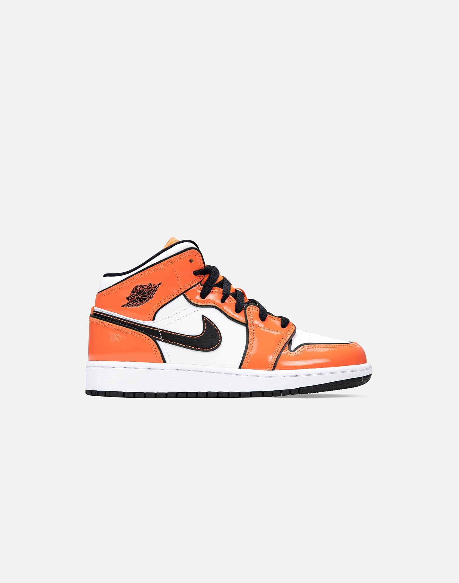 orange and white jordan 1 grade school