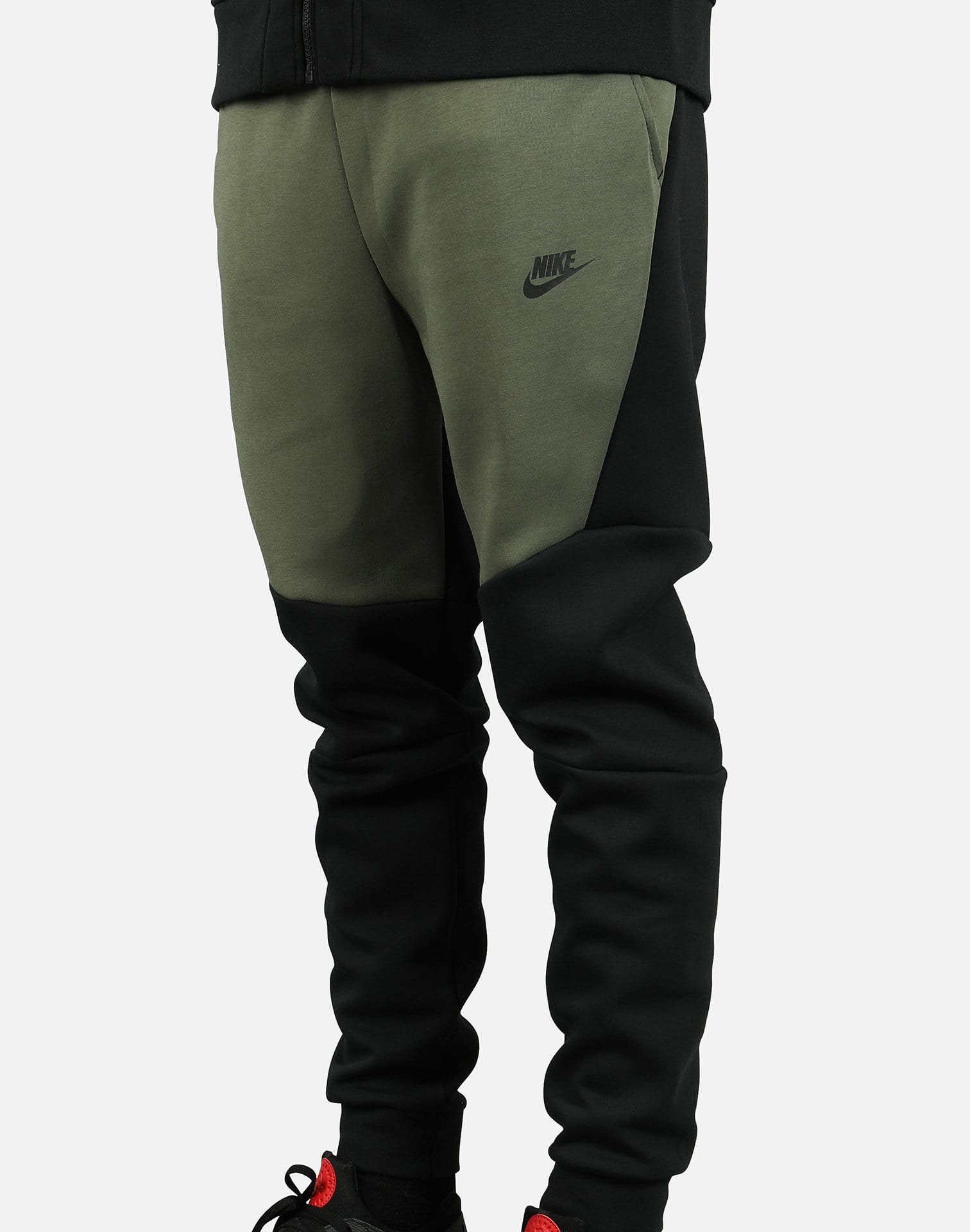 olive green nike tech suit