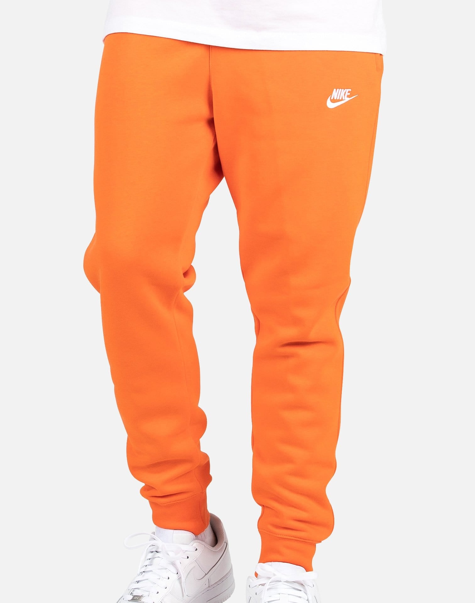 orange nike joggers