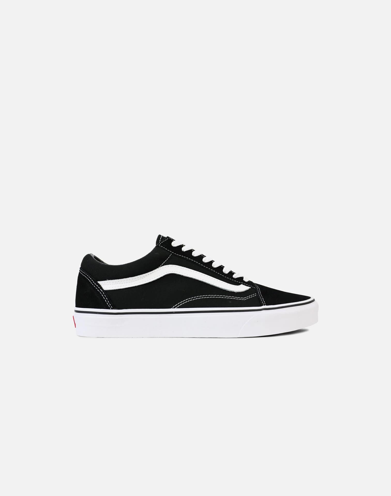 white slip on vans grade school