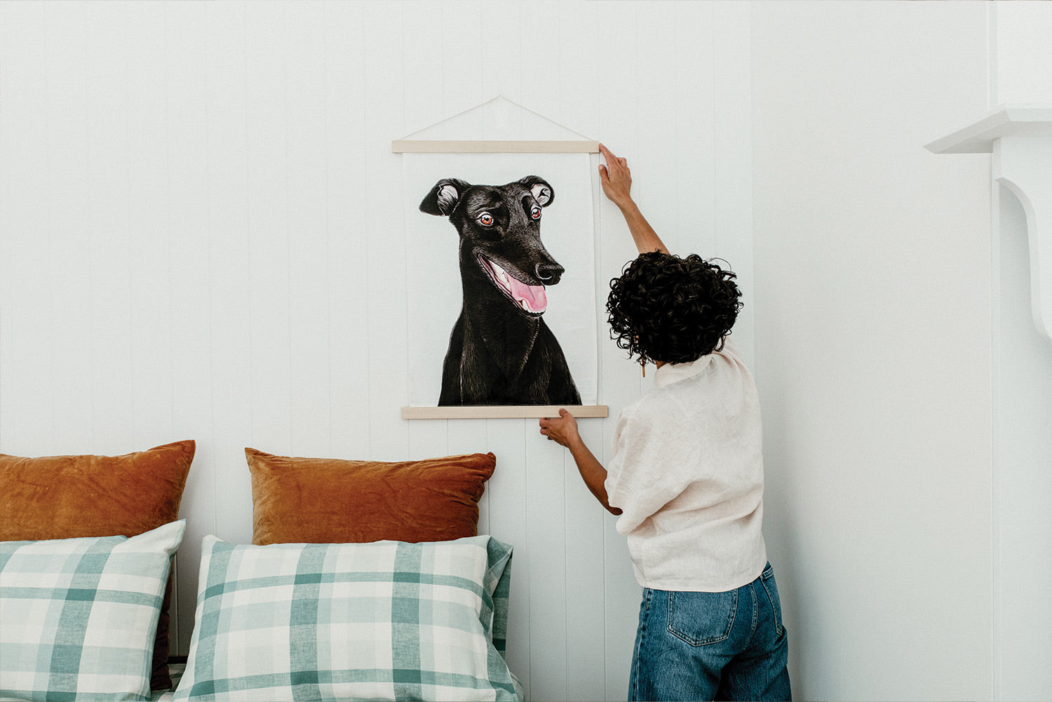 Dee hanging black greyhound linen tea towel as artwork