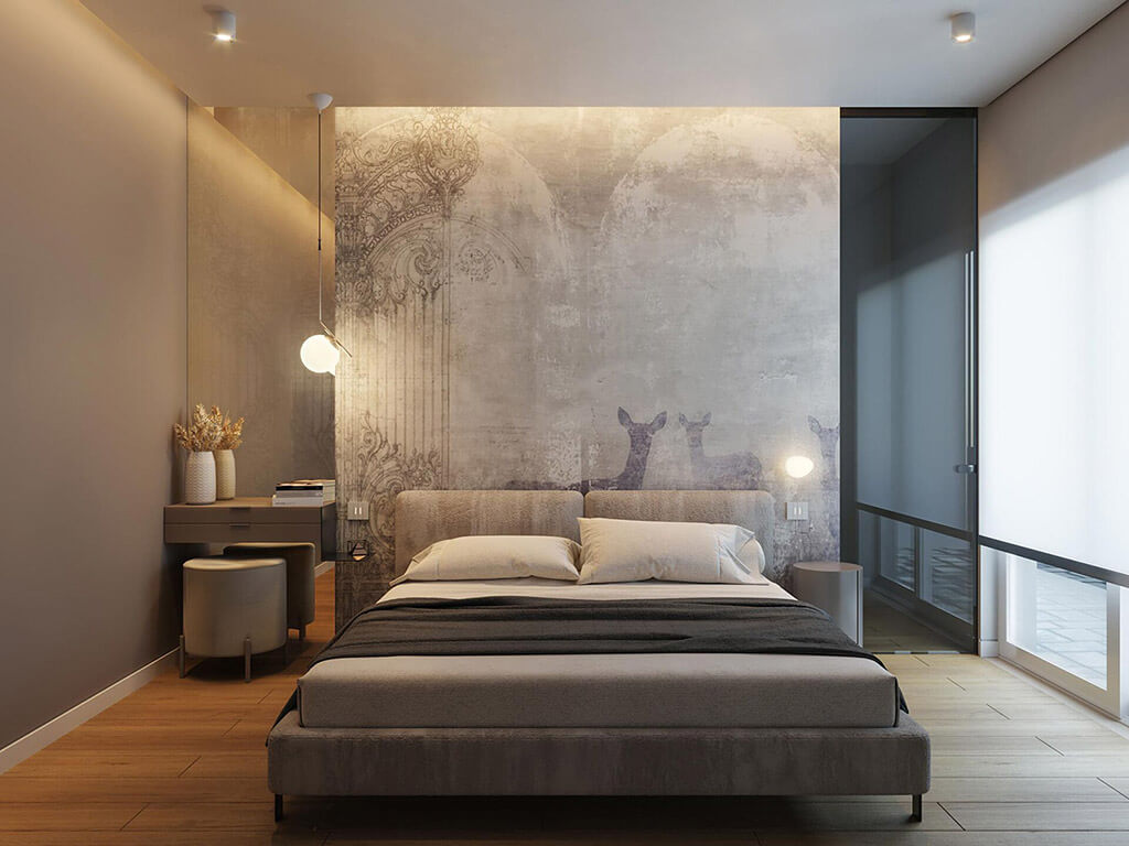 Wall mural in muted colours featuring deer. The wall mural is used behind a double bed