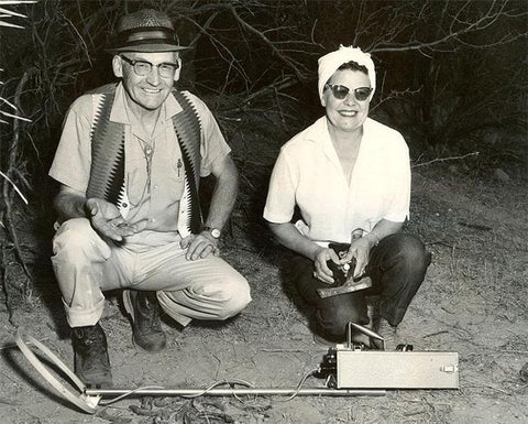 dr fisher and wife with one of his early metal detectors