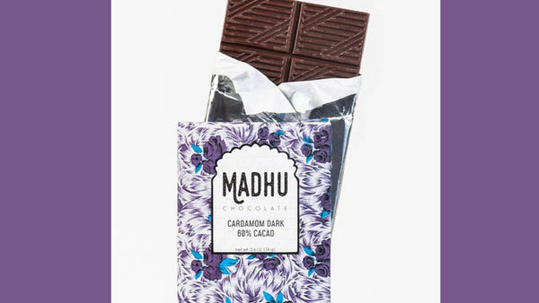 Madhu chocolate bar on white and purple background