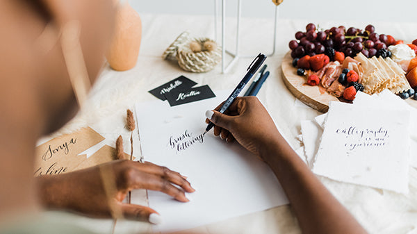 Amanda Reid doing brush calligraphy