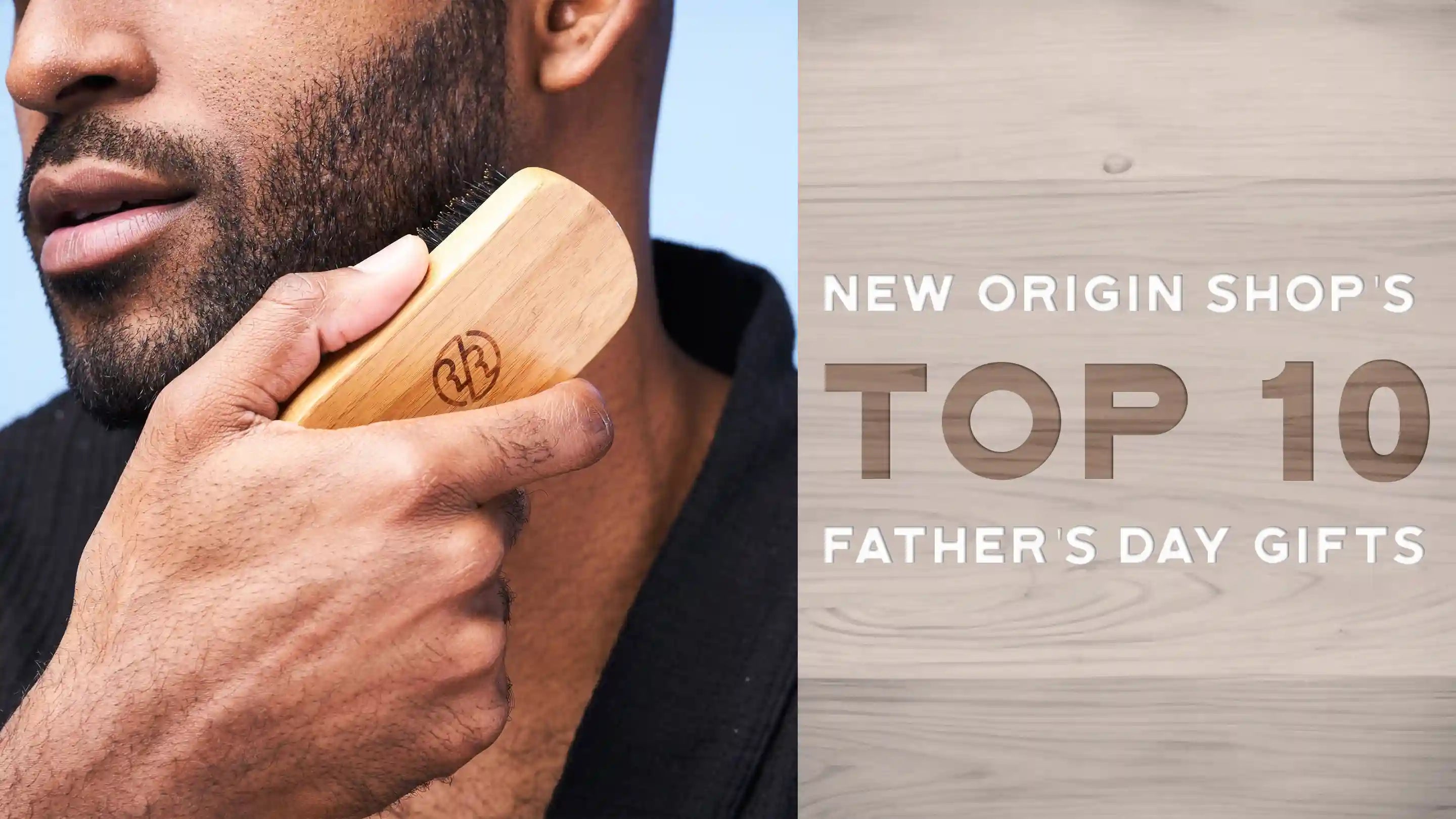 Image of a man brushing his beard. Next to him, there are words on a wood background. The words read "New Origin Shops top 10 father's day gifts"