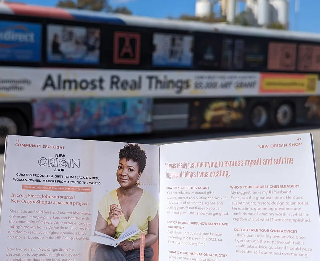 New Origin Shop Interview in Almost Real Things Magazine in front of Almost Real Things bus