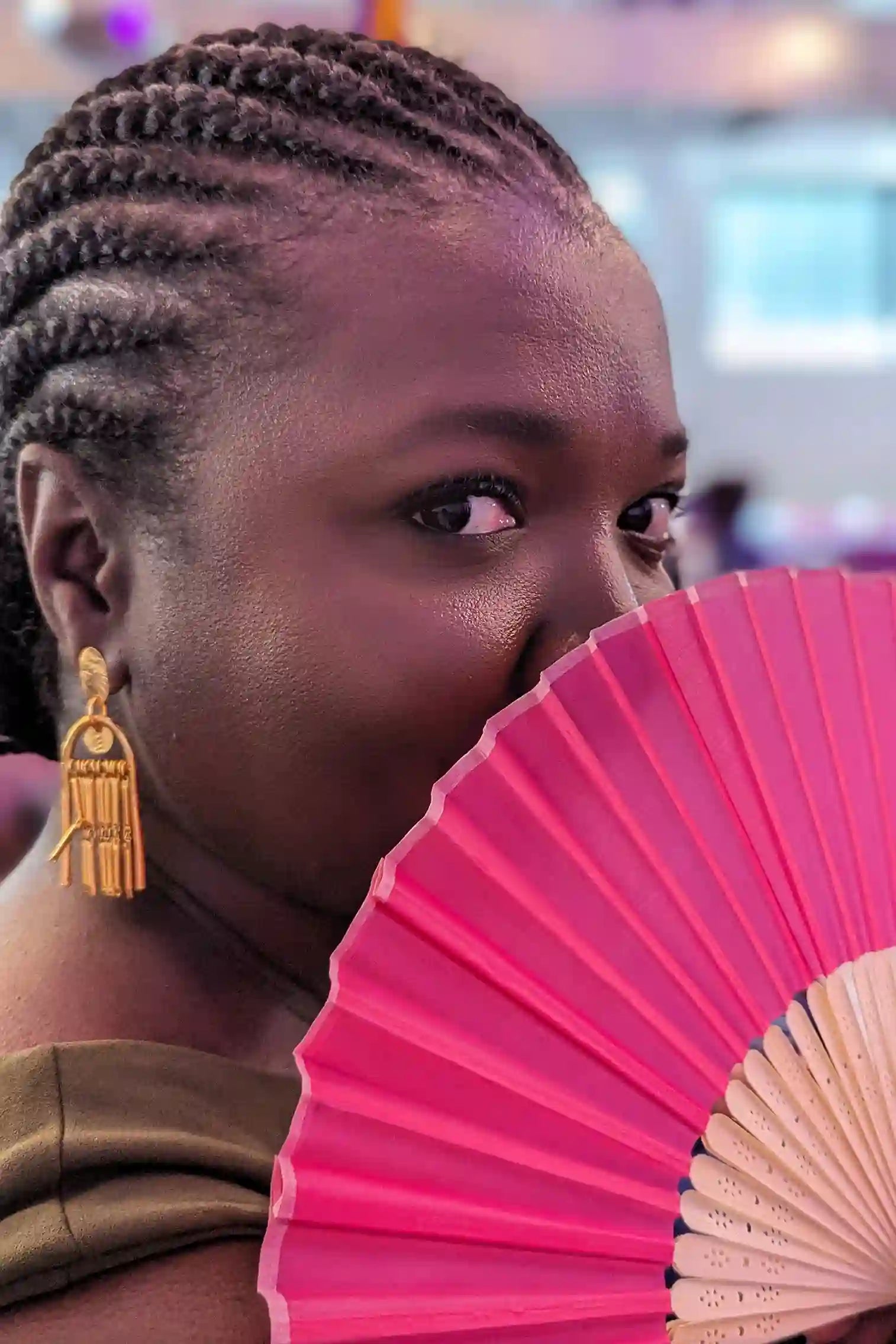 Sierra Lewis with a Pink Fan